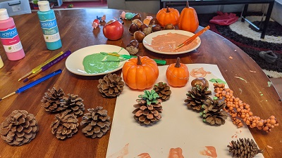 painting pinecones with kids